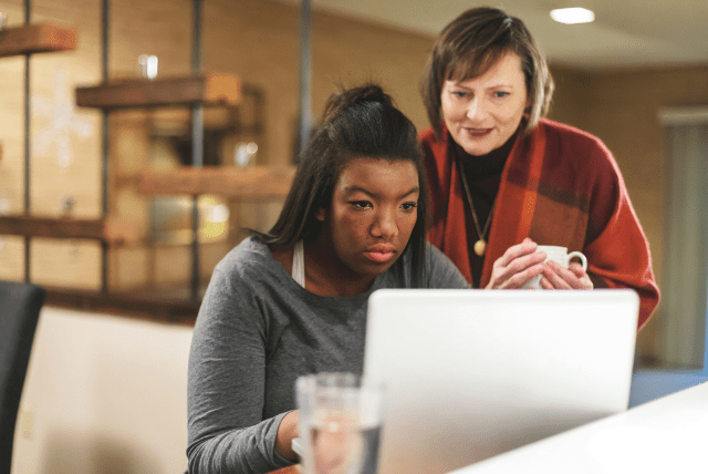 adopted women looking at laptop