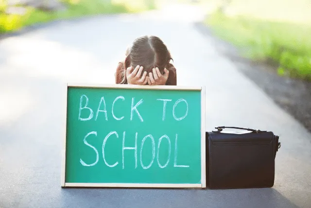 Girl with green board