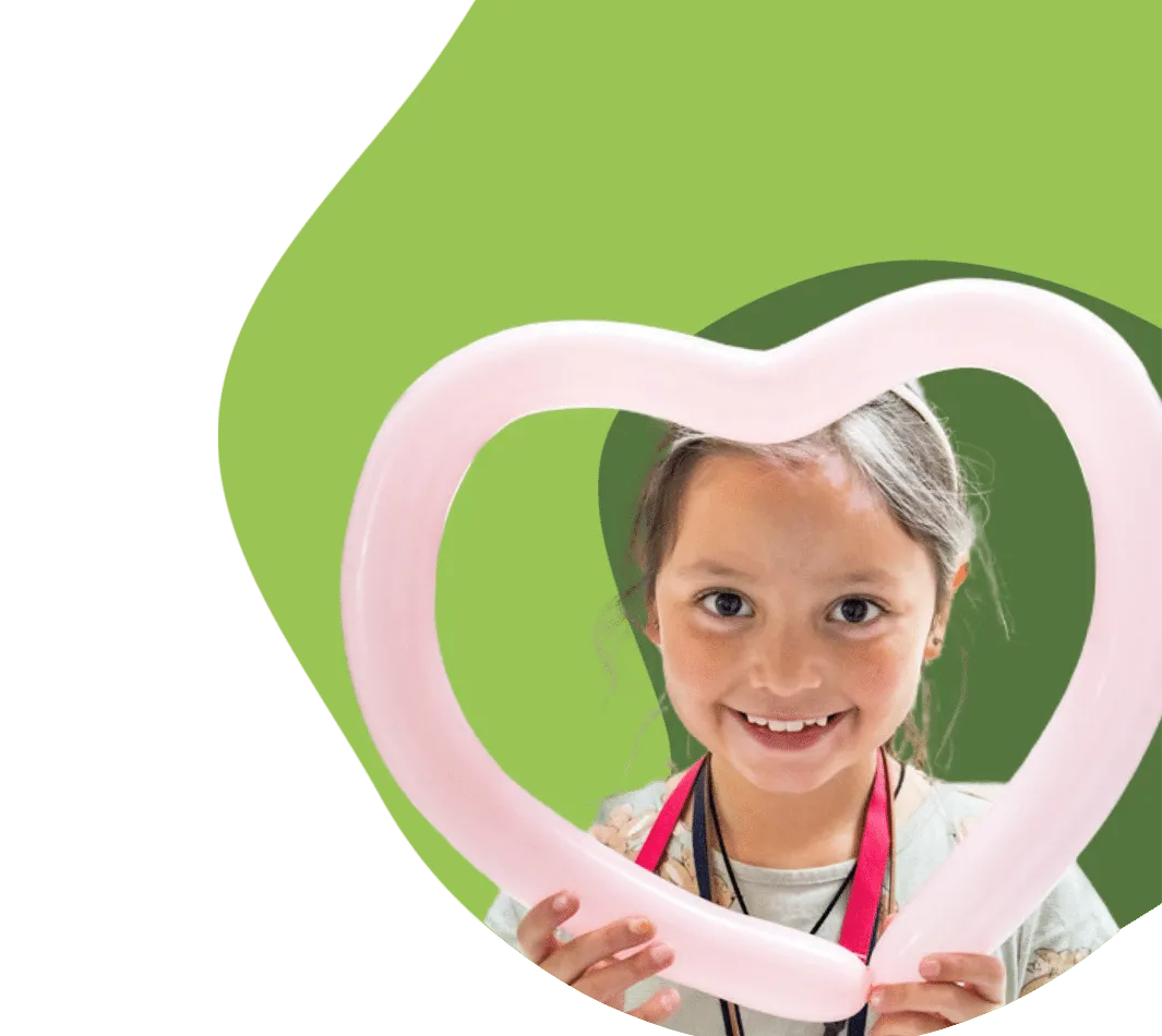 Childrens Champion Girl Holding Heart Balloon