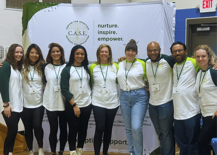 C.A.S.E. Emerging Leaders standing together with C.A.S.E. CEO Debbie Riley