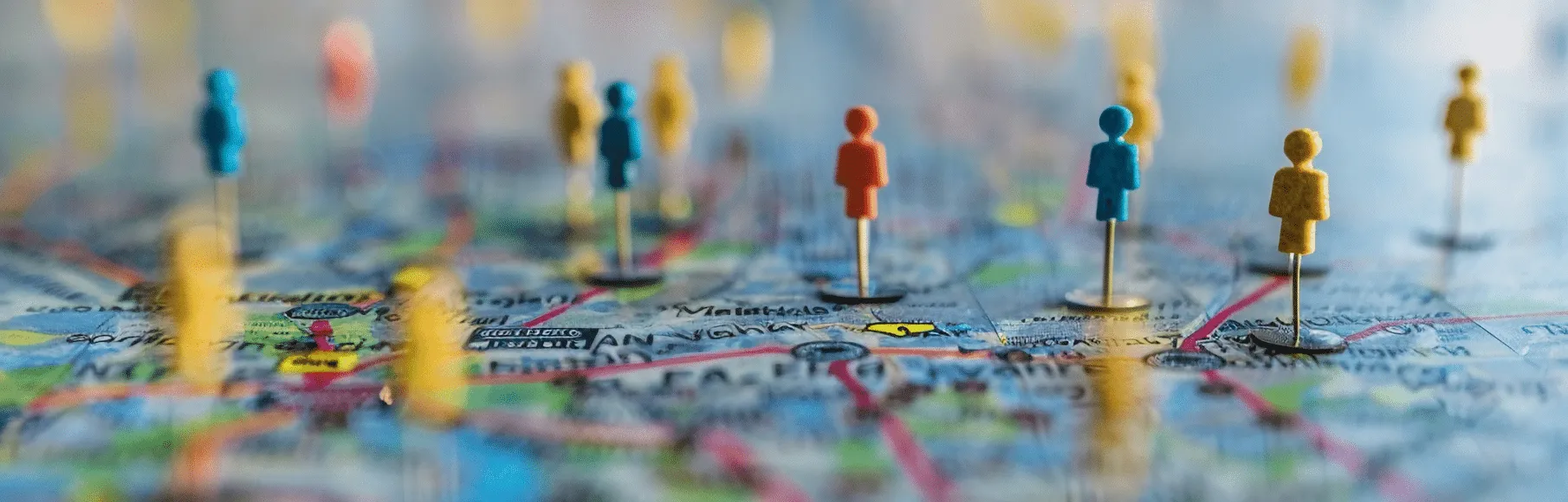 People pins on a world map