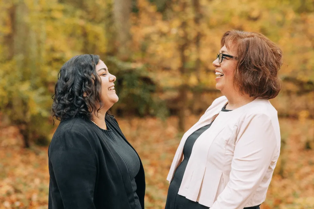 Ashley & her adoptive mom smiling at each other