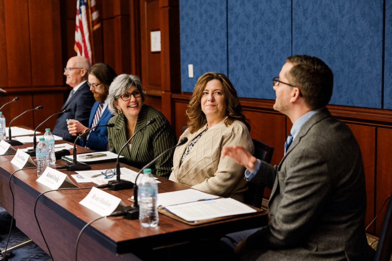 Dawn Wilson, Director, C.A.S.E. Institute, talking with other presenters at the Congressional Forum