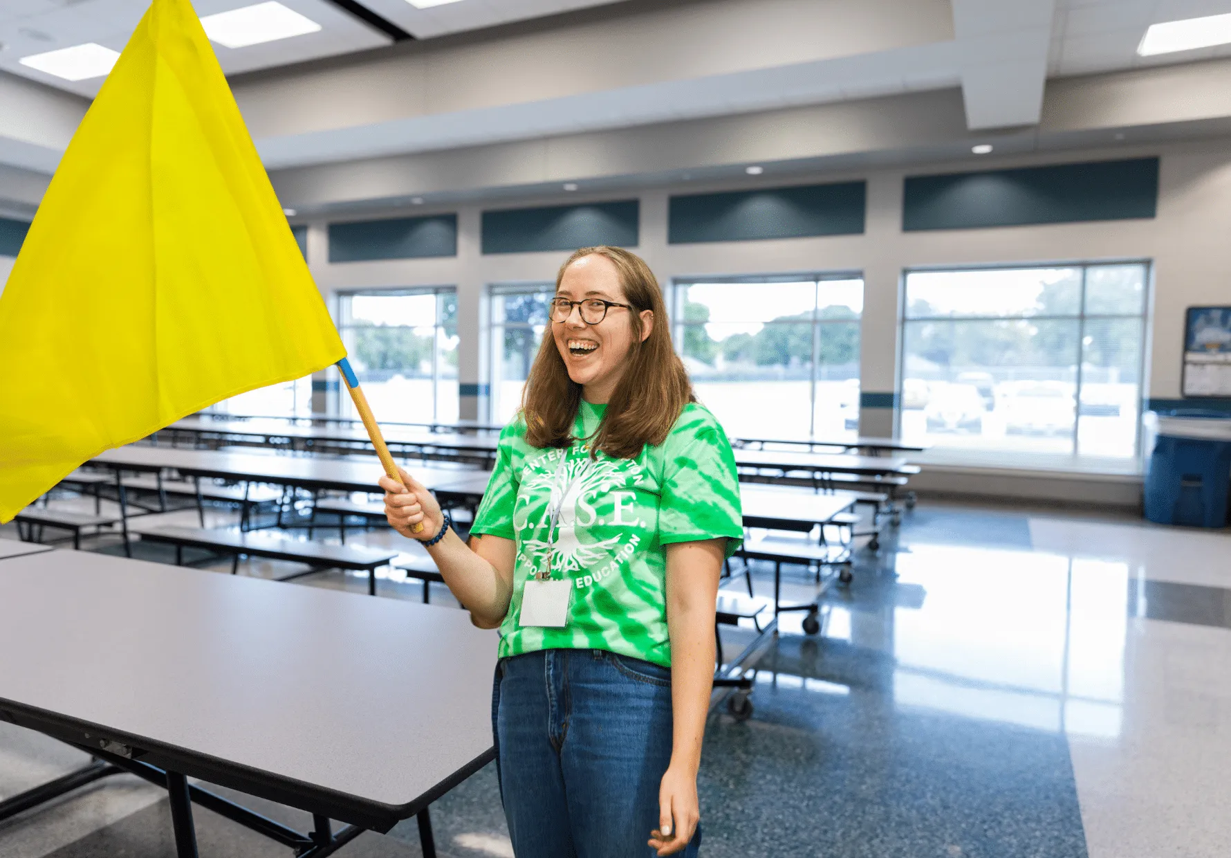 Catey Yost Adult Adoptee in School Setting Cafeteria