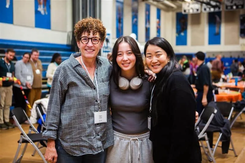 Adoptive Mom, Adoptive Daughter and Birth Mother Smiling Together in Reunion