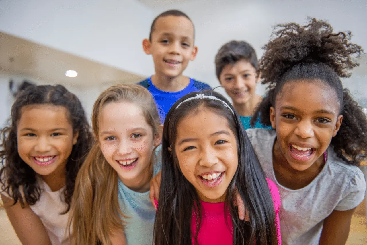 Diverse kids smiling together