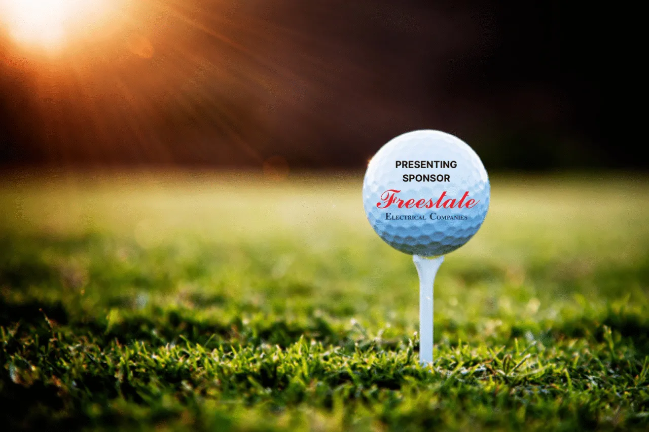 Golf sitting on tee - Presenting Sponsor Freestate Electric